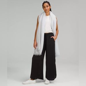 Brand new unopened Lululemon woven scarf in pretty light blue color.